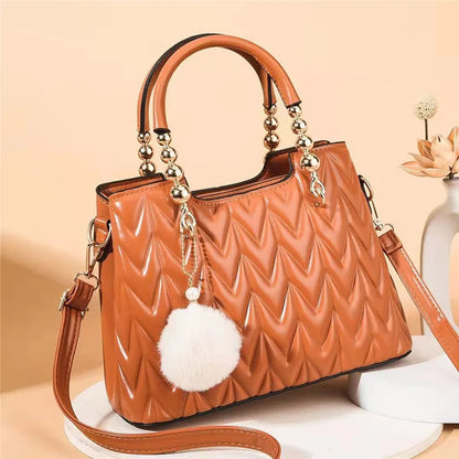 Crossbody Bucket Bag with Fur Ball Pendant