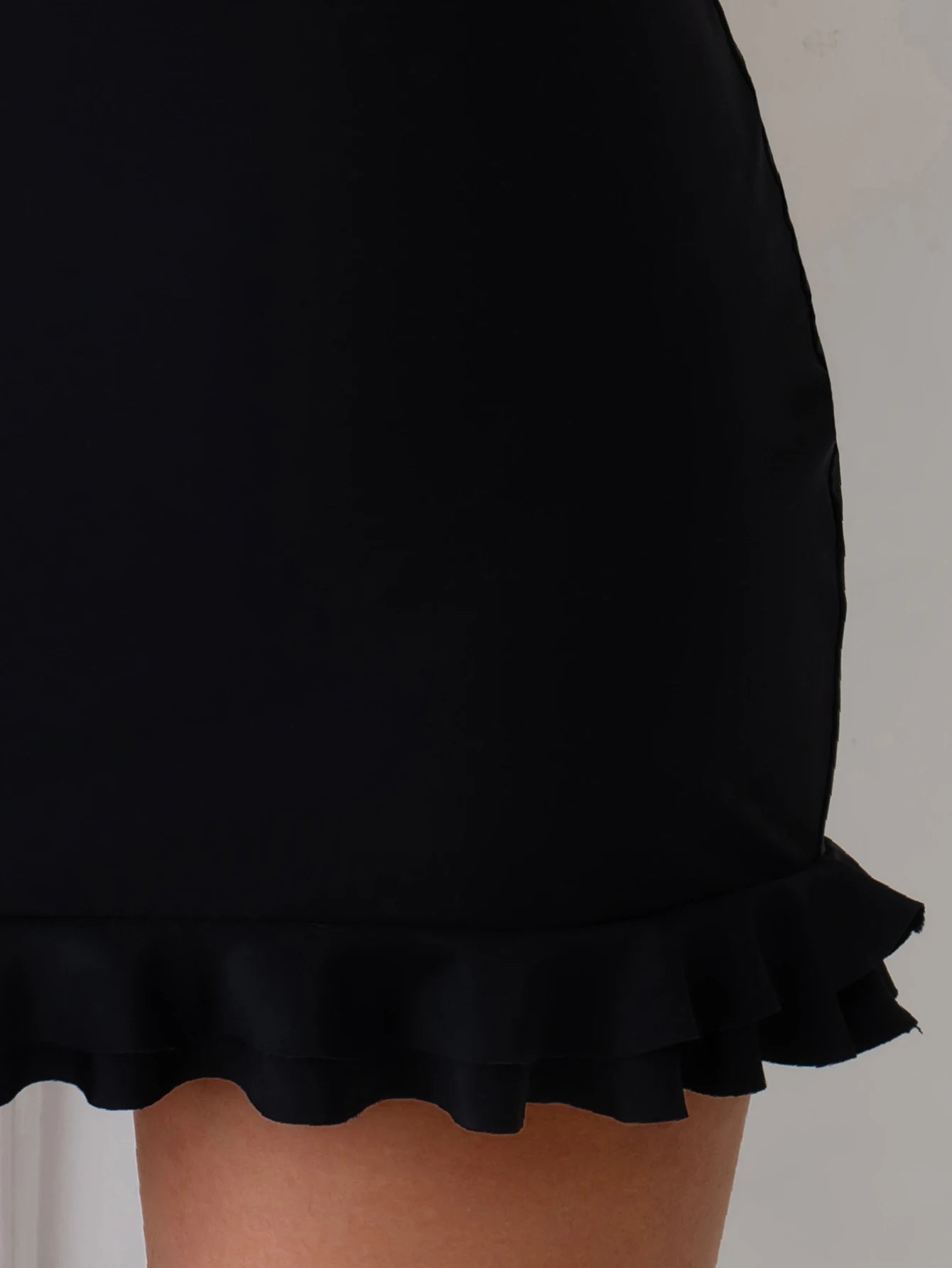 Black Pleated Mini Skirt - High-Waisted Bodycon with Ruffled Hem