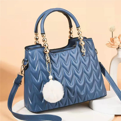 Crossbody Bucket Bag with Fur Ball Pendant