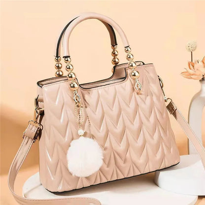 Crossbody Bucket Bag with Fur Ball Pendant