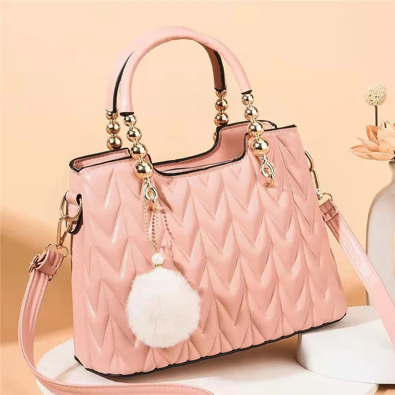 Crossbody Bucket Bag with Fur Ball Pendant