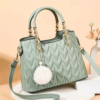 Crossbody Bucket Bag with Fur Ball Pendant